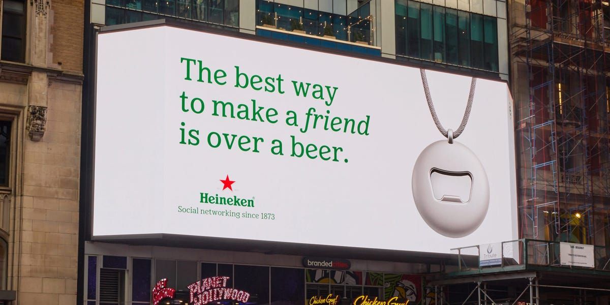 New Yorkers defaced subway ads for Friend's AI wearable. Then Heineken joined the fray with a cheeky billboard.