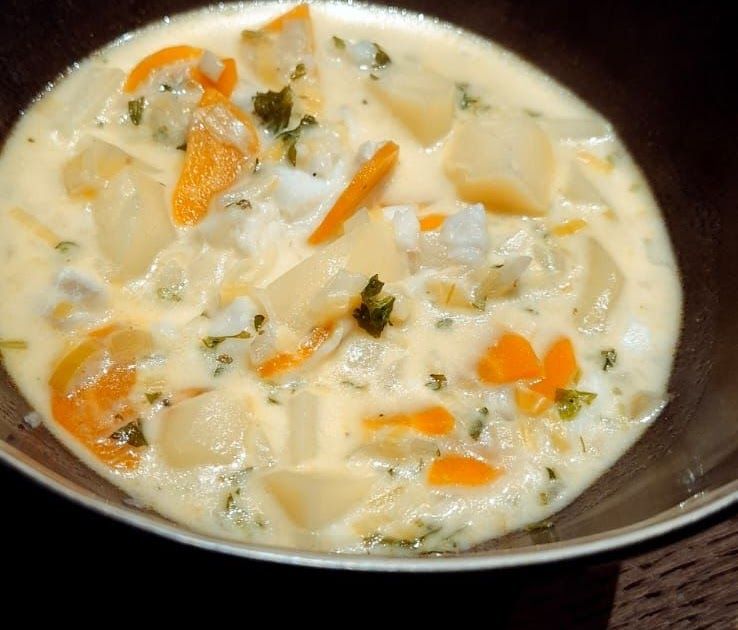 Waterzooi met witte vis, wortel, prei, ui, courgette en knolselder