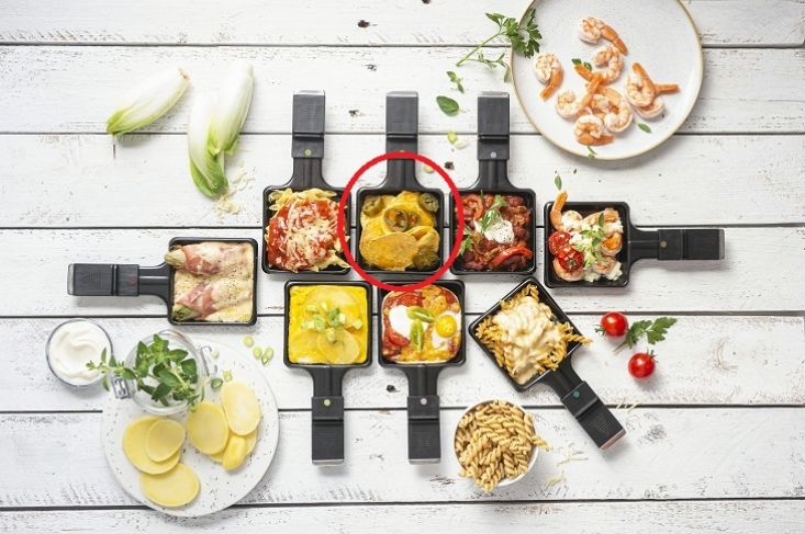 Nacho’s con queso in een raclettepannetje