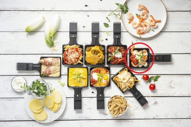 Scampi - Kers­tomaat - Feta - Oregano in een raclettepannetje