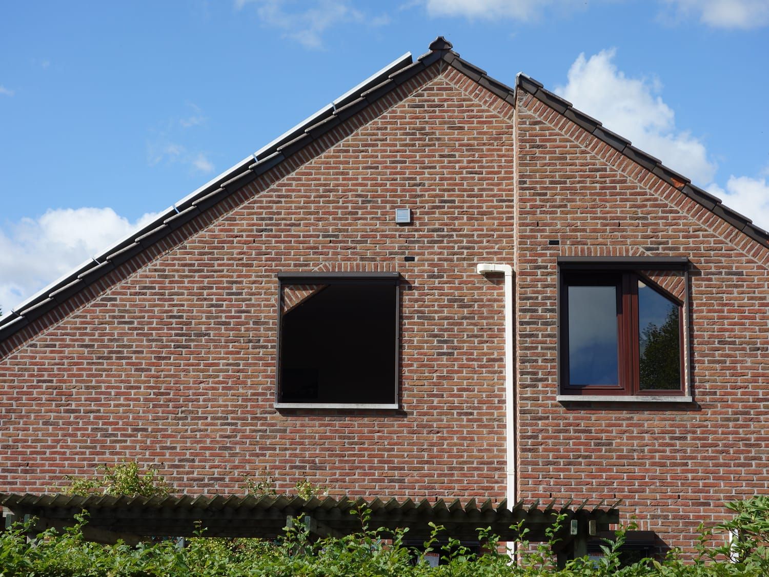 Overzetmontage in Bilzen: PVC naar aluminium